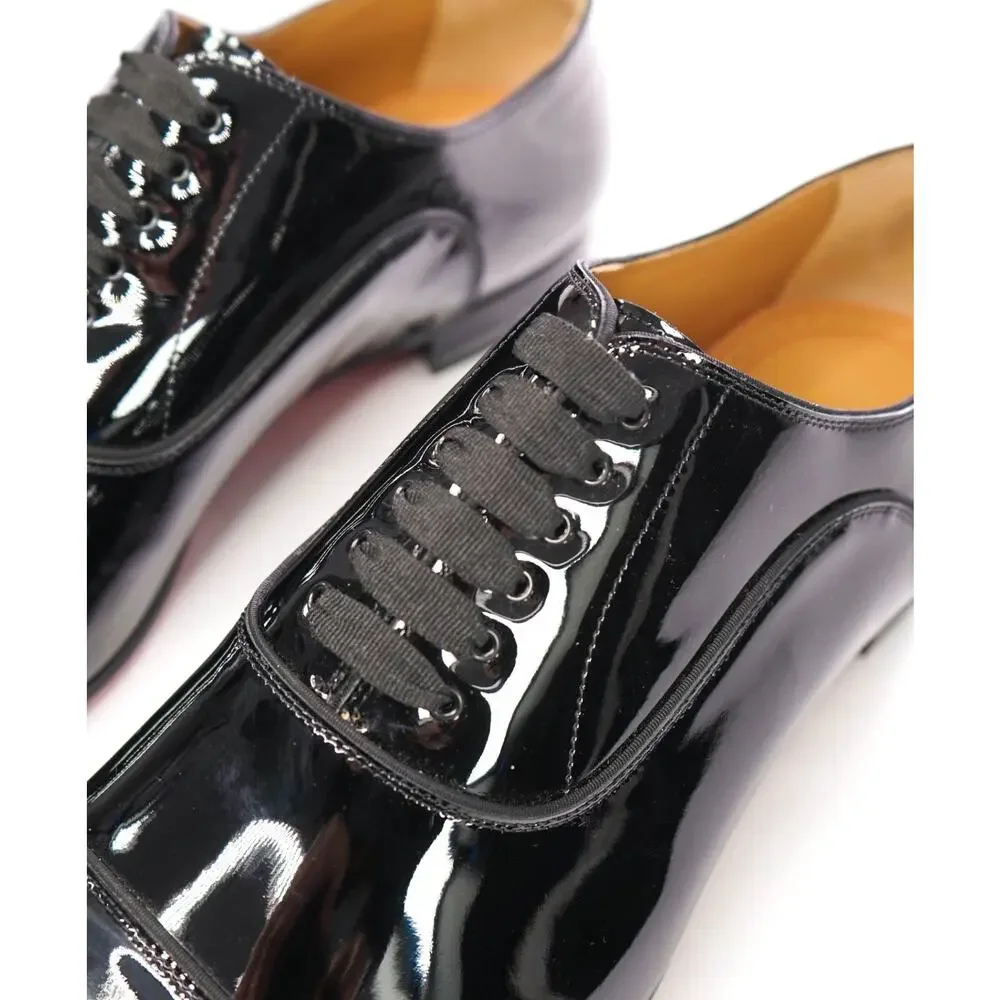 $1,295 LOUBOUTIN - Black Patent 